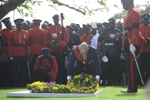 Shorn Hector/Photographer Sir Patrick Allen, Govenor General of Jamaica lays a wreath on the entombed area of the late Edward Seaga at the National Heroes Cricleon Sunday June 23, 2019.