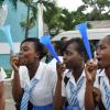 Jermaine Barnaby/Photographer
Students at Edwin Allen High school in Clarendon celebraiting their schools' triumph in the GraceKennedy/ Lime/ISSA champs in Clarendon on Monday March 30, 2015.