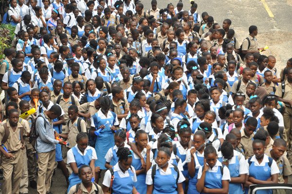Jermaine Barnaby/Photographer
An overhead view of students at Edwin Allen celebrating Champs win at the school on Monday March 30, 2015.