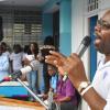Jermaine Barnaby/Photographer
Dr. Everton Walters (right) principal of Edwin Allen speaking to students during their Champs celebration at the school on Monday March 30, 2015.