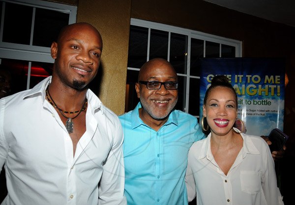 Winston Sill/Freelance Photographer
Offical opening of Everblazing Boutique, Bar and Lounge, held at Villa Ronai, Old Stony Hill Road on Tuesday night September 10, 2013. Here are Asafa Powell (left); Kingsley Cooper (centre); and Tara Playfair Scott (right).