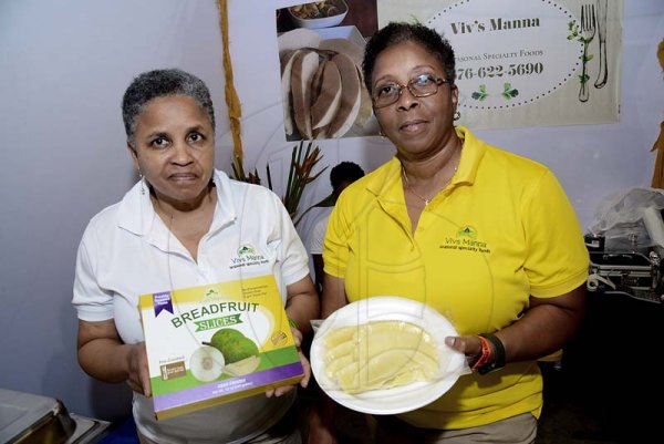 Rudolph Brown/ Photographer<\n>Vivienne Green Evans, (left) of Vivs Manna show off her product at the JEA JMA Expo Jamaica at the National Indoor Sports Centre and the National Arena on Sunday April 22, 2018<\n><\n><\n>
