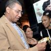 Rudolph Brown/ Photographer<\n>Kareen Lamme, (right) licensed Beauuty Therapist of Bute Cosmetics show  Prime Minister Andrew Holness her product while Michelle Chong, (centre) President, Jamaica Exporters' Association (JEA) during a tour of the JEA JMA Expo Jamaica at the National Indoor Sports Centre and the National Arena on Sunday April 22, 2018<\n><\n><\n>