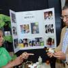 Rudolph Brown/ PhotographerChristal-Ann Thompson, Founder and CEO of Honey Vera, give the Prime Minister Andrew Holness one of her Hemp product during a tour of the JEA JMA Expo Jamaica at the National Indoor Sports Centre and the National Arena on Sunday April 22, 2018