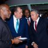 Shorn Hector/Photographer  Brain Bennette-Easy General Manger Digicel Jamaica (left) ishowcasing the lates in technolofy that digicel has to over to The Hon. Audley Shaw and Metry Seaga at Expo Jamaica 2018 Opening Ceremony at the National Indoor Sports Complex on April 19 2018