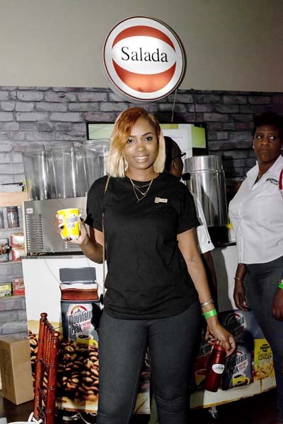 Zarabelle talent manager, Tasha Kay Miller, warmed up to the taste of her Jamaica Mountain Peak coffee at the Salada Foods Jamaica booth at Expo Jamaica 2018.