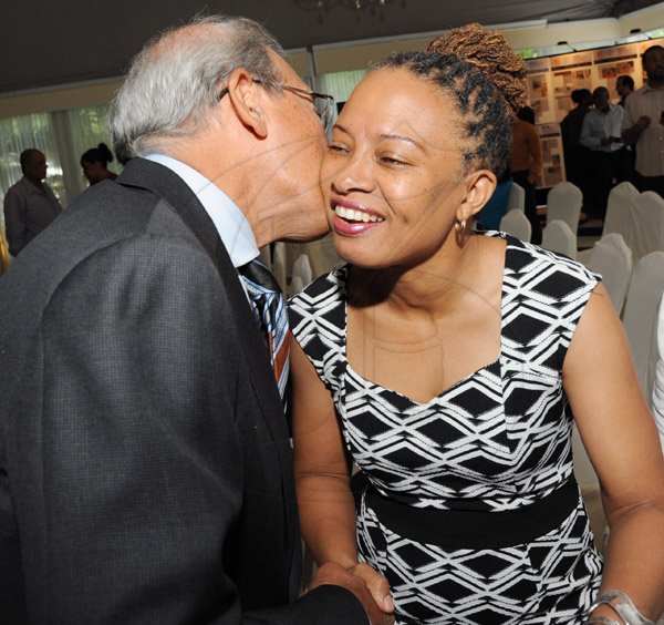 Rudolph Brown/ Photographer
Robert Levy, Chairman of Jamaica Broilers Group greets Dionne Jackson Miller President of PAJ at the Fair Play award of excellence 2013/2014 held at the Tera Nova Hotel, Kingston on September 16, 2014