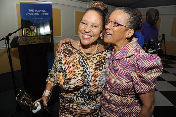 Rudolph Brown/ Photographer
Fay Ellington greets Angel Thame at the Fair Play award of excellence 2013/2014 held at the Tera Nova Hotel, Kingston on September 16, 2014