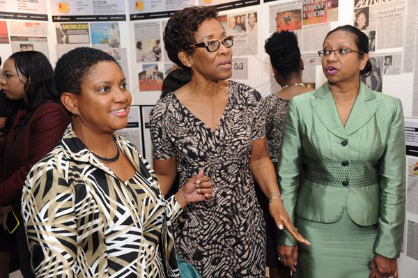 Rudolph Brown/ Photographer
Joan Forrest Henry, (left) Divisional Sales and Marketing Manager of Best Dressed Chicken, Dr. Claudette Cooke, (centre) and Charmaine Silvera at the Fair Play award of excellence 2013/2014 held at the Terra Nova Hotel, Kingston on September 16, 2014