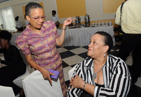 Rudolph Brown/ Photographer
Former Editor Wyvolyn Gager of the Gleaner chat with Fay Ellington at the Fair Play award of excellence 2013/2014 held at the Terra Nova Hotel, Kingston on September 16, 2014