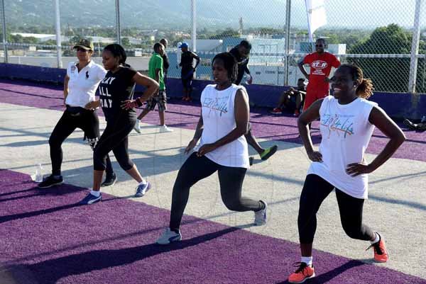 Lionel Rookwood/PhotographerThe Gleaner's Fit 4 Life Sweatfest at the Life Fit Training Centre, 15 3/4 Red Hills Road, St Andrew, with aerobics instructor O.J. O'Gilvie on Saturday, November 18, 2017. *** Local Caption *** Lionel Rookwood/PhotographerParticipants in The Gleaner's Fit 4 Life Sweatfest with aerobics instructor O.J. O'Gilvie at the Life Fit Training Centre on Saturday.