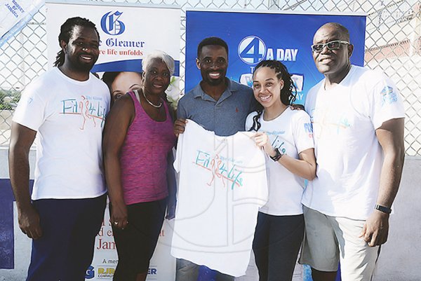 Lionel Rookwood/PhotographerThe Gleaner's Fit 4 Life Sweatfest at the Life Fit Training Centre, 15 3/4 Red Hills Road, St Andrew, with aerobics instructor O.J. O'Gilvie on Saturday, November 18, 2017. *** Local Caption *** Lionel Rookwood/PhotographerFrom left: fitness coach Marvin Gordon; Mary Dick, Gleaner HR Services assistant manager; LeVaughn Flynn, co-owner Life Fit Training Centre; Amashika Lorne, Gleaner marketing officer; and Rainford Wint, Gleaner sales manager.