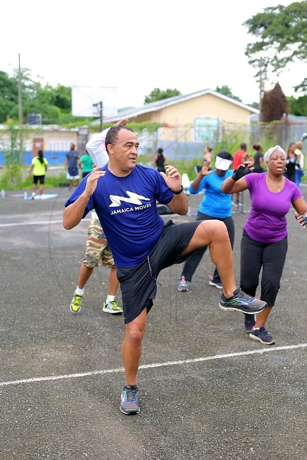 The Gleaner's Fit 4 Life event with the Trainfit Club's Outdoor Madness, Boxing Fitness with Sakima Mullings and Self Defense with Master Arthur Barrows on Saturday, November 11, at In Motion Gym, Shortwood Teachers' College, St Andrew. *** Local Caption *** Minister of Health Dr Christopher Tufton shows how serious he is about health at The Gleaner's Fit 4 Life event with the Trainfit Club's Outdoor Madness, Boxing Fitness with Sakima Mullings and Self Defense with Master Arthur Barrows on Saturday at In Motion Gym, Shortwood Teachers' College, St Andrew.