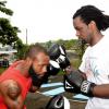 Lionel Rookwood/PhotographerThe Gleaner's Fit 4 Life event with the Trainfit Club's Outdoor Madness, Boxing Fitness with Sakima Mullings and Self Defense with Master Arthur Barrows on Saturday, November 11, at In Motion Gym, Shortwood Teachers' College, St Andrew. *** Local Caption *** Lionel Rookwood/PhotographerContender champion Sakima Mullings and The Gleaner's fitness coach Marvin Gordon went at it.