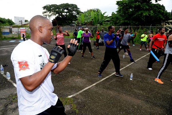 Lionel Rookwood/PhotographerThe Gleaner's Fit 4 Life event with the Trainfit Club's Outdoor Madness, Boxing Fitness with Sakima Mullings and Self Defense with Master Arthur Barrows on Saturday, November 11, at In Motion Gym, Shortwood Teachers' College, St Andrew.