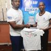 Lionel Rookwood/PhotographerThe Gleaner's Fit 4 Life event with Body By Kurt - FitMix - 3-The-Hard-Way - at 23 Haining Road, New Kingston on Saturday, October 28, 2017.  *** Local Caption *** Lionel Rookwood/PhotographerRohan Phillips (right), second place winner in the Burpees Challenge, getting his gift from The Gleaner's Fit 4 Life fitness coach, Marvin Gordon.