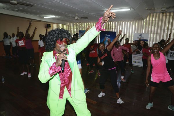 Lionel Rookwood/PhotographerThe Gleaner's Fit 4 Life event with Body By Kurt - FitMix - 3-The-Hard-Way - at 23 Haining Road, New Kingston on Saturday, October 28, 2017.  *** Local Caption *** Lionel Rookwood/PhotographerKurt Dunn was all donned up in his 70s outfit to deliver the  Body By Kurt - FitMix - 3-The-Hard-Way.