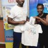Lionel Rookwood/PhotographerThe Gleaner's Fit 4 Life event with Body By Kurt - FitMix - 3-The-Hard-Way - at 23 Haining Road, New Kingston on Saturday, October 28, 2017.  *** Local Caption *** Lionel Rookwood/PhotographerSecond place winner Arlette Robinson in the Wata Challenge, receiving her prizes from The Gleaner's Fit 4 Life fitness coach, Marvin Gordon.