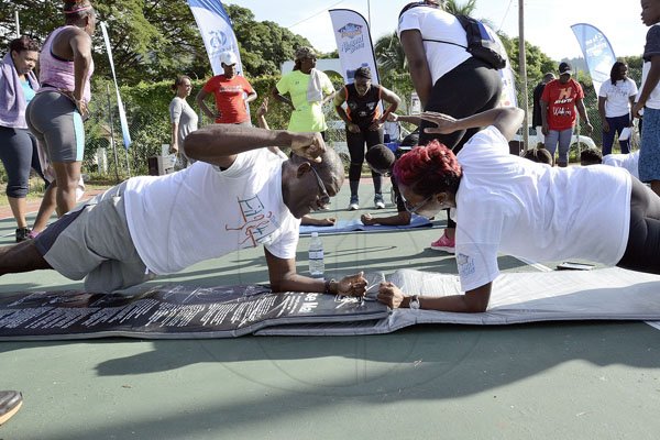 Ian Allen/PhotographerThe Gleaner's Fit 4 Life team at Hope Pastures Park, Hope Pastures, St Andrew on Saturday, October 14, 2017. *** Local Caption *** Ian Allen/PhotographerParticipants taking on the team challenge at The Gleaner's Fit 4 Life event at Hope Pastures Park, Hope Pastures, St Andrew on Saturday.