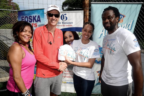 Lionel Rookwood/Photographer

From left: Yulit Gordon, executive director of the Jamaica Cancer Society,Bruce Kidner, second-place winner of the men's pushup challenge; The Gleaner's Amashika Lorne and Marvin Gordon at The Gleaner's Fit 4 Life and St Matthew's Walkers event on Saturday, October 7, 2017 at the Jacks Hill Community Centre in St Andrew.