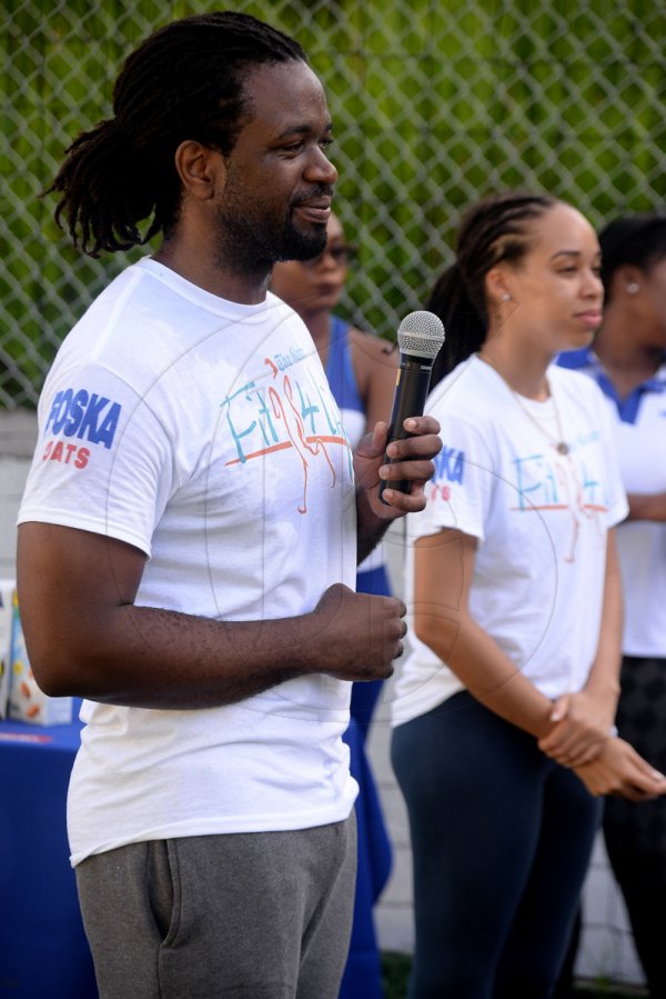 Lionel Rookwood/Photographer

The Gleanerr's Marvin Gordon addresses particcipants at The Gleaner's Fit 4 Life and St Matthew's Walkers event on Saturday, October 7, 2017 at the Jacks Hill Community Centre in St Andrew.
