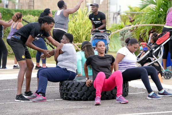 Lionel Rookwood/PhotographerThe Gleaner's Fit 4 Life boot camp with Sweet Energy Fitness Club at Jacaranda Homes in Inswood, St Catherine on Saturday, November 25, 2017 *** Local Caption *** Lionel Rookwood/PhotographerParticipants in The Gleaner's Fit 4 Life boot camp with Sweet Energy Fitness Club at Jacaranda Homes in Inswood, St Catherine on Saturday.