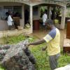 Ricardo Makyn/Staff Photographer.
Residents of Nightingale Grove in St Catherine cleaning off the Mud and Silt from their Furniture due to Flooding in the Community on Wednesday 29.9.2010.