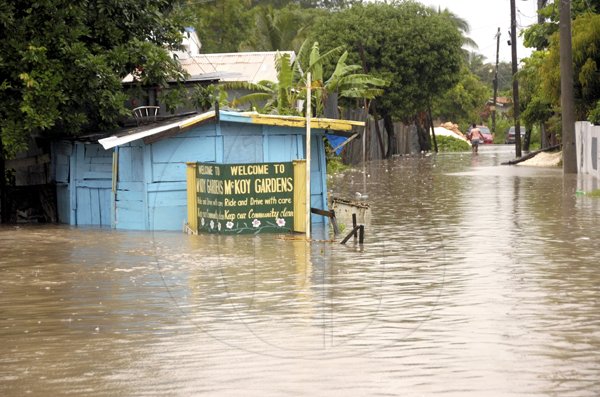 Ricardo Makyn/Staff Photographer.
 A section of Walks Road adjacent to the McKoy Gardens community 






is Flooded in Spanish Town on Wednesday 29.9.2010.