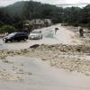 Adrian Frater photo

A workcrew from the National Works Agency (NWA) were tasked with clearing rocks and debris that were washed down from Long Hill, and deposited onto the Reading main road in Montego Bay, St. James.
