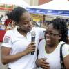 Gladstone Taylor / Photographer

Terry-Karelle Reid acknoledges Rosemarie Liang (right) as the winner of the maggie slogan contest  as seen at the Gleaner company food moth promotion held at shoppers fair super market on brunswick avenue, spanish town on saturday