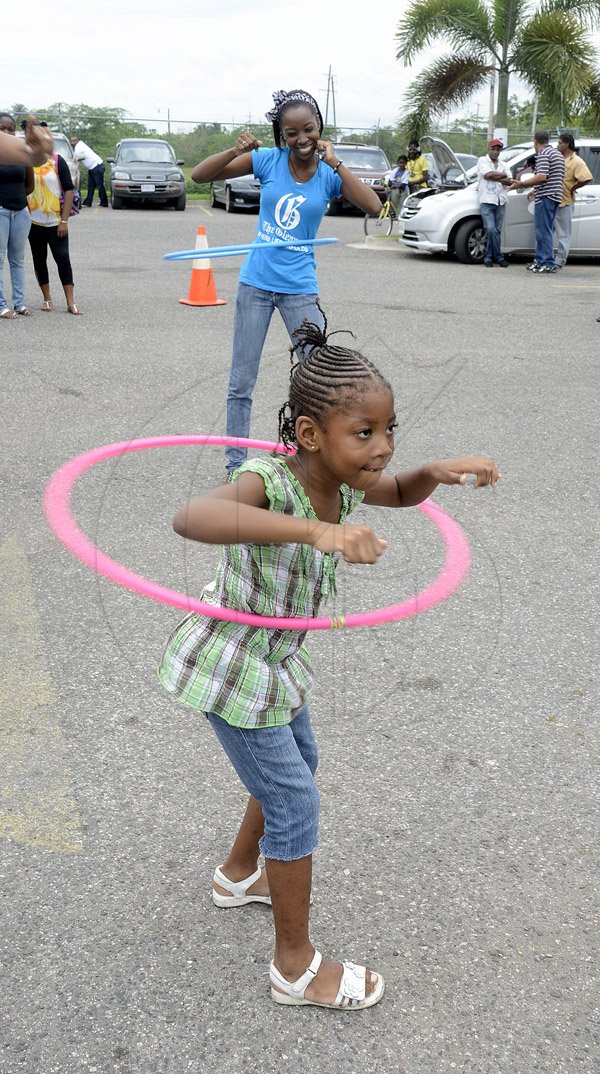 Gladstone Taylor / Photographer

Hoola Hoop  contest  as seen at the Gleaner company food moth promotion held at shoppers fair super market on brunswick avenue, spanish town on saturday