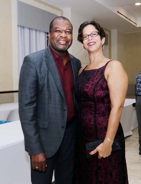 Ashley Anguin photo<\n>Clifton Reader (managing director, Moon Palace Jamaica Grande, enjoys a moment with wife Anna, from the Tourism Product Development Company.<\n><\n><\n><\n>