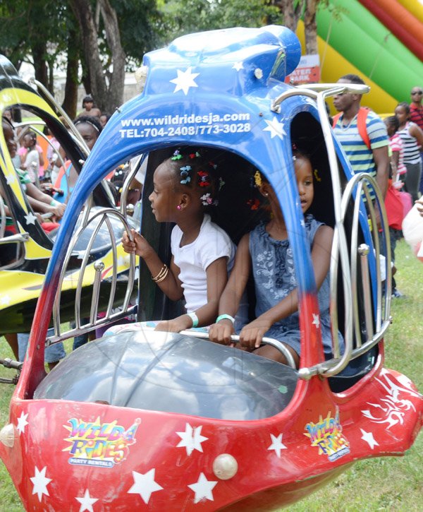 Rudolph Brown/Photographer
Children having fun at Funfest at Hope Garden on Sunday, December 21, 2014