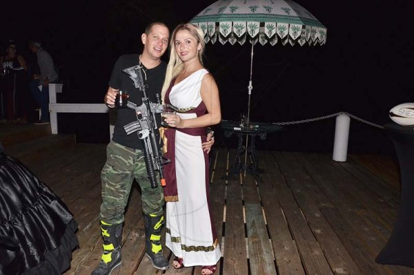 Adam Gomes dressed as a default character from 'Fort Nite' while his date Nina Perez is Khaleesi from Games of Thrones.