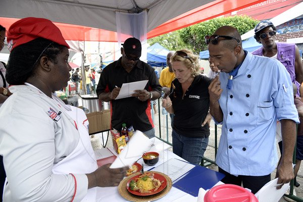 Gladstone Taylor / Photographer

judges sample the jf mills team meal as seen at the gas pro street style cook up held on tower street held last week saturday.