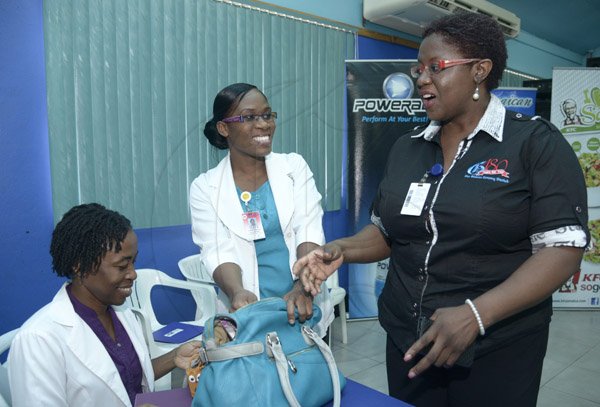 Gladstone Taylor / Photographer

Terri Wilson (Assistant Manager, Business Development and Marketing, The Gleaner Company) speaks with Deputy Director of physiotherapy services Grace Stepheson (left) and Senior physiotherapist and co-ordinator of special projects, UWHI, physiotherapy department Antoinette Mclean (center)

The Gleaner Company Limited launch of " The Gleaner 180 5k run" held at the Gleaner Sports Club  yesterday morning.