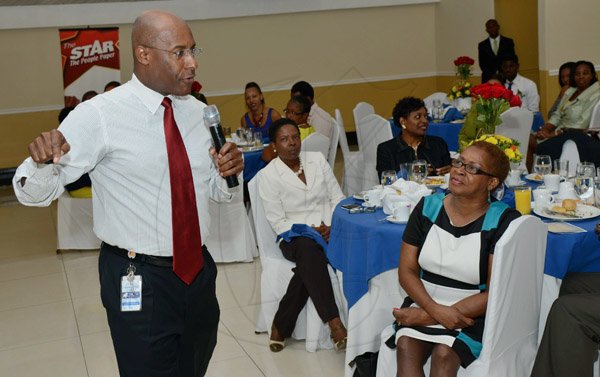 Rudolph Brown/Photographer
AubynHill, CEO of Corporate Strategies Limited speaks at the Gleaner sales awards ceremony at the Terra Nova Hotel in Kingston on Monday, January 20, 2014