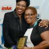 Rudolph Brown/Photographer
Karen Cooper, (right) make presentation to Janet Silvera at The Gleaner sales awards ceremony at the Terra Nova Hotel in Kingston on Monday, January 20, 2014
