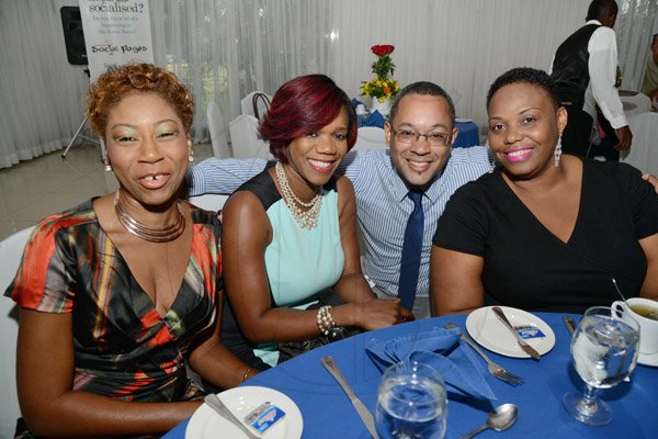 Rudolph Brown/Photographer
Christopher Barnes, (second left) Managing Director of the Gleaner pose with from left Sandra Brown Bennett, Janice Levy and Sophia Davis Johnson at The Gleaner sales awards ceremony at the Terra Nova Hotel in Kingston on Monday, January 20, 2014