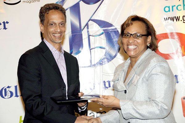 Rudolph Brown/Photographer
Andrew Rousseau receives the most improved award from the Gleaner's Credit Manager Grace Salmon.


Advertisers and Agency awards luncheon at the Jamaica Pegasus Hotel in New Kingston on Monday, February 22-2010