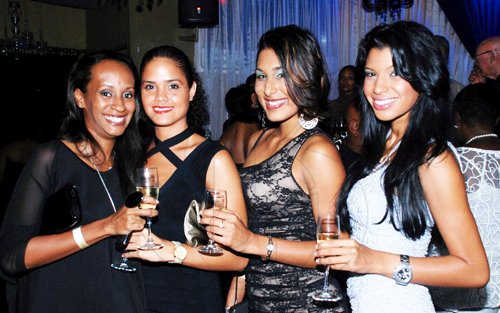 Colin Hamilton/Freelance Photographer
Newly-crowned Miss Jamaica World Danielle Crosskill (right) hangs out with gal pals (from left) Yanique Sterling, Alissa Forrester and Nalini Jagnarine at The Global Party at Fiction on Thursday September 15, 2011.