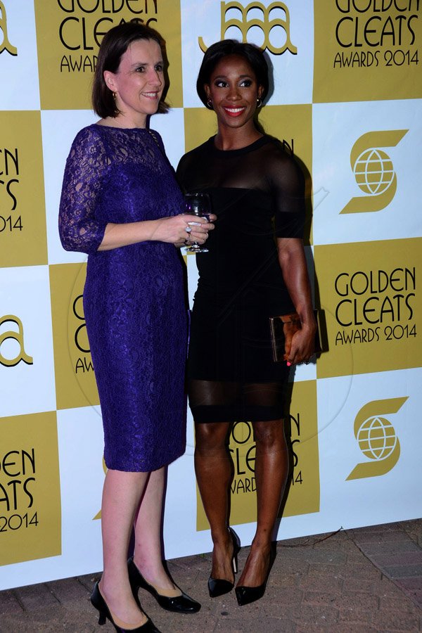 Winston Sill/Freelance Photographer
JAAA/Scotiabank Group presents the Golden Cleats Awards 2014 Ceremony, held at Terra Nova All-Suite Hotel, Waterloo Road on Friday night December 12, 2014. Here are Julia Sutherland (left), Deputy British High Commissioner; and Shelly-Ann Fraser-Pryce (right).