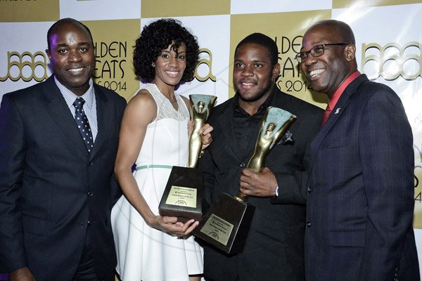 Winston Sill/Freelance Photographer
JAAA/Scotiabank Group presents the Golden Cleats Awards 2014 Ceremony, held at Terra Nova All-Suite Hotel, Waterloo Road on Friday night December 12, 2014. Here are Hugh Miller, chief operating officer, Scotia Investments Jamaica. Hugh Miller, of Scotiabank; Kaliese Spencer (second left); O'Dayne Richards (second right); and Hugh Reid (right), President Scotia Insurance.