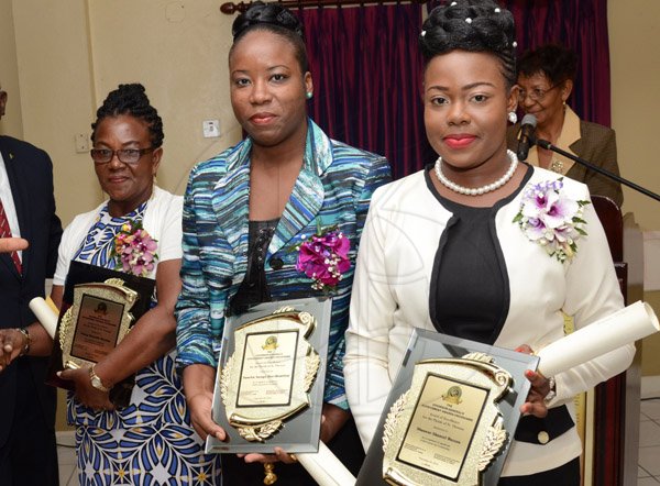 Rudolph Brown/Photographer
From left are Pansy Murphy, Tameka Hue Hamilton and Shanese Watson pose with their awards Governor General’s Achievement Award for the County of Surrey presentation Ceremony for recipients on Thursday, September 25, 2014