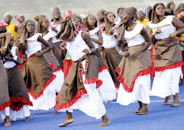 Ricardo Makyn/Staff Photographer
                                                                                          Folk dancers entertain the crowd.                                                                                                                                                                                                                                                                                                                                                                                                                                                                                                   Grand Gala to mark Jamaica's 49th Year of Independence at the National Stadium on Independence Day Saturday 6.8.2011