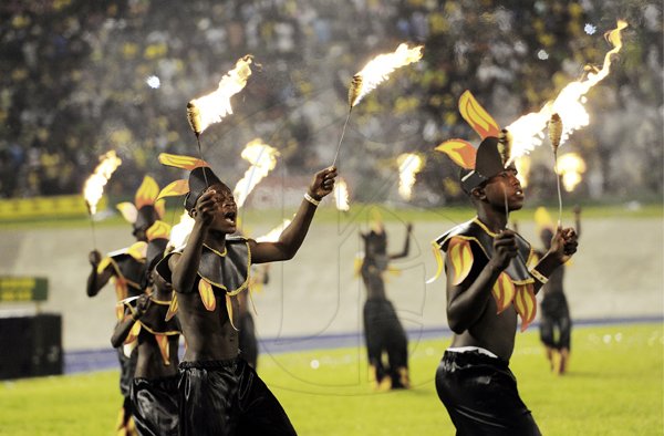 Ricardo Makyn/Staff Photographer
                                                                                 These fiery dancers certainly added to the spectacle at the Grand Gala                                                                                                                                                                                                                                                   to mark Jamaica's 49th Year of Independence at the National Stadium on Independence Day Saturday 6.8.2011
