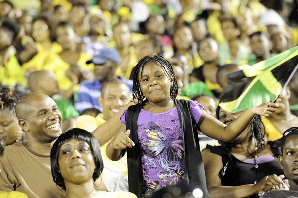 Ricardo Makyn/Staff Photographer
                                                                                     This child seemed proud to be part of the grand celebrations as she waves her Jamaican flag.                                                                                                                                                                                                       Grand Gala to mark Jamaica's 49th Year of Independence at the National Stadium on Independence Day Saturday 6.8.2011