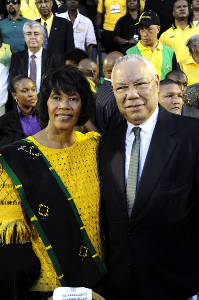 Norman Grindley/Chief Photographer
Prime Minister Portia Simpson Miller lymes with General Colin Powell at yesterday's Independence Grand Gala at the National Stadium. Powell led a contingent specially sent by US President Barack Obama.

 August 6,2012.