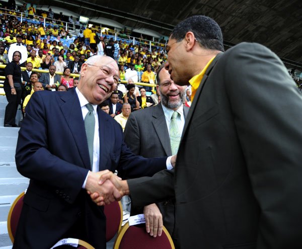 Norman Grindley/Chief Photographer
Opposition Leader Andrew Holness (right) jokes with General Colin Powell (left) and CARICOM Secretary-General Irwin Larocque at yesterday's Independence Grand Gala at the National Stadium.

 August 6