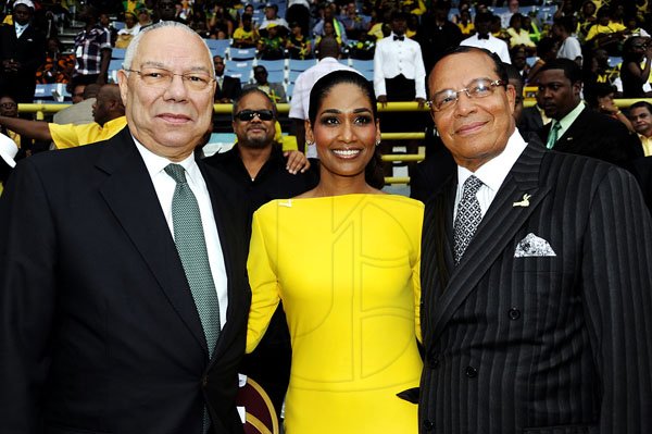 Norman Grindley/Chief Photographer
Youth and Culture Minister Lisa Hanna shares camera time with General Colin Powell (left) and Nation of Islam Leader Louis Farrakhan at yesterday's Independence Grand Gala at the National Stadium.

 August 6,2012.